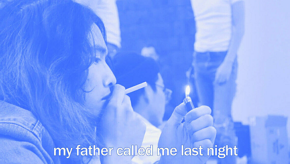 A person lighting the cigarettes. 