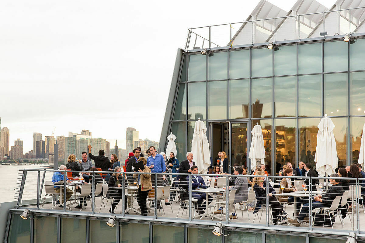 Visitors dine on the Studio Cafe rooftop.