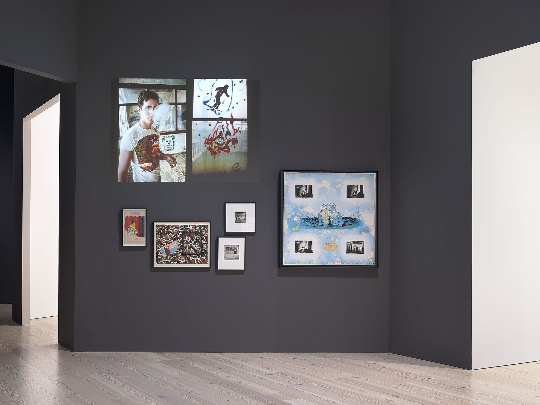 An image of the Whitney galleries with various artworks on the wall