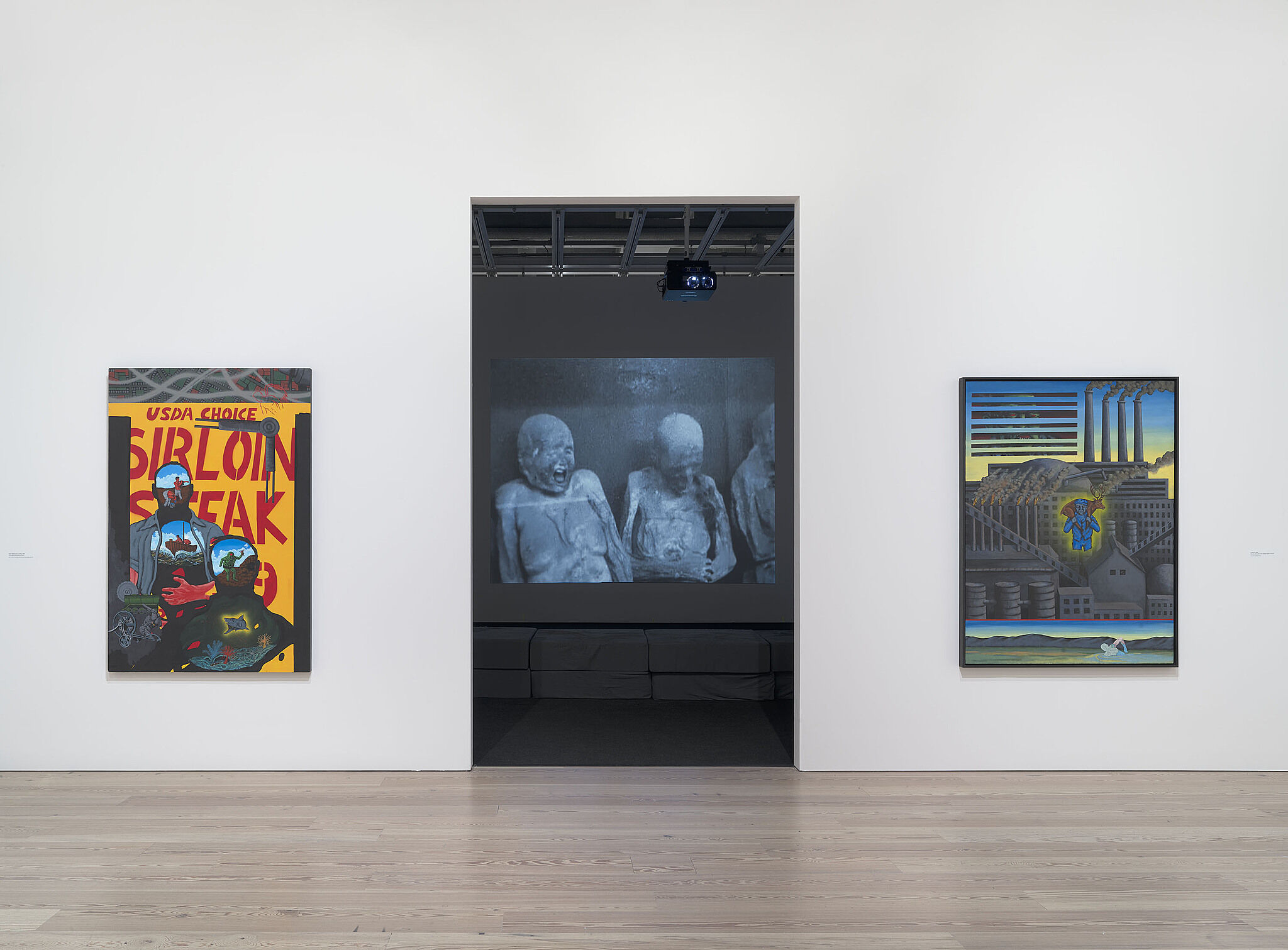 An image of the Whitney galleries with various artworks on the wall