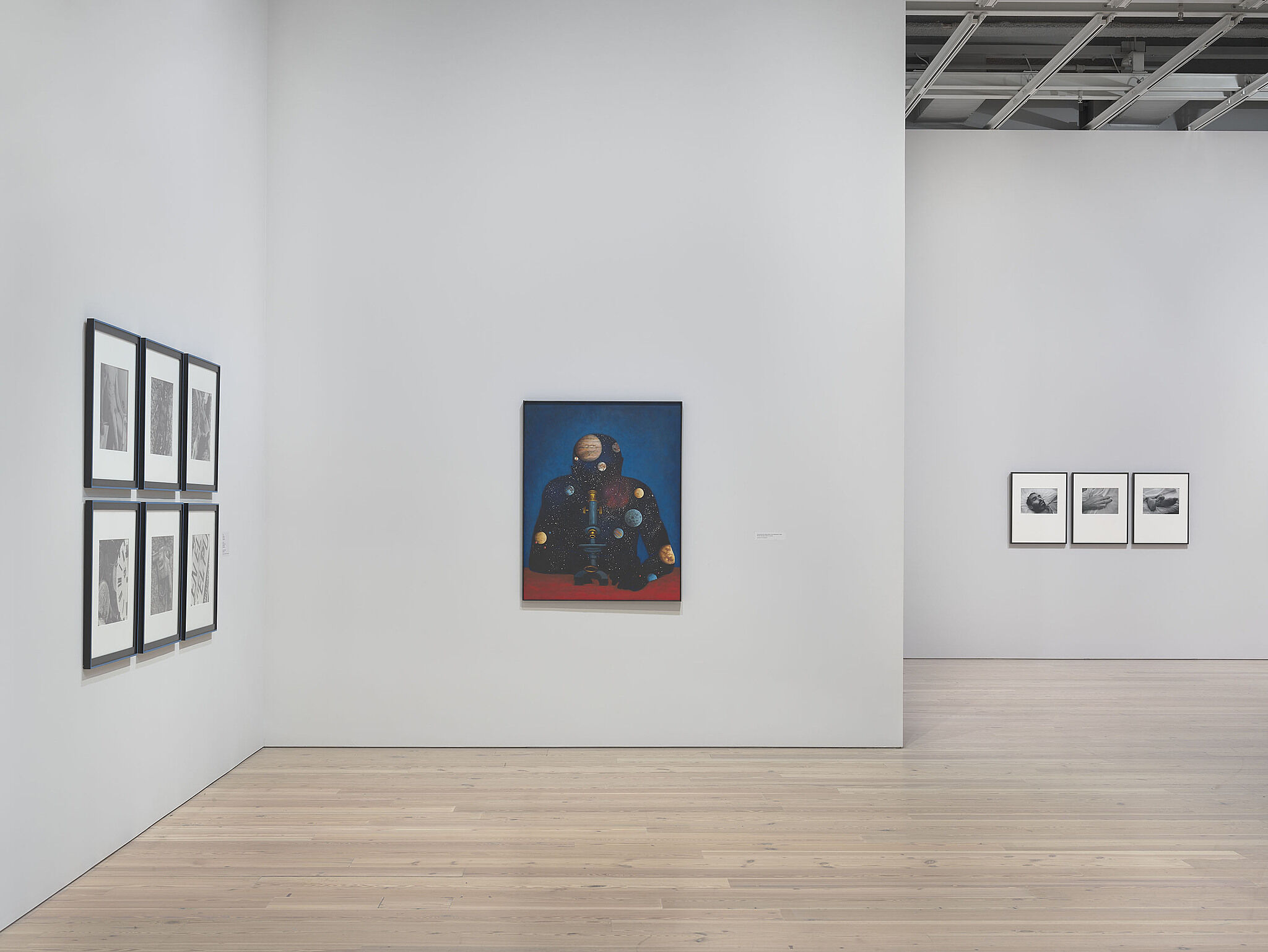An image of the Whitney galleries with various artworks on the wall