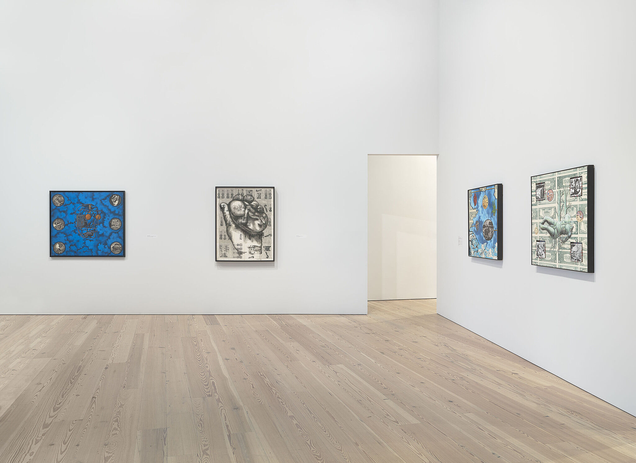 An image of the Whitney galleries with various artworks on the wall