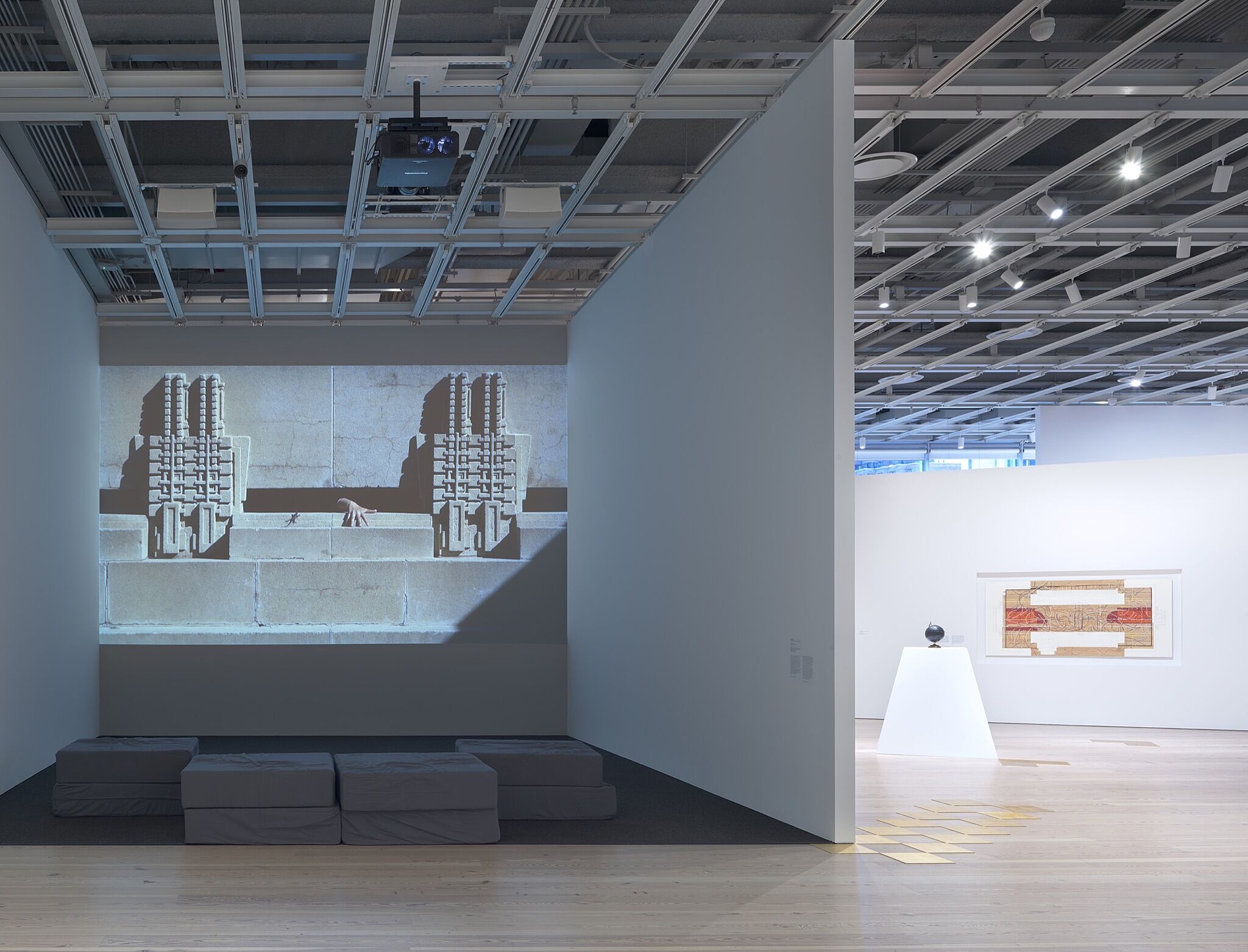 A photo of the Whitney galleries with various artworks.