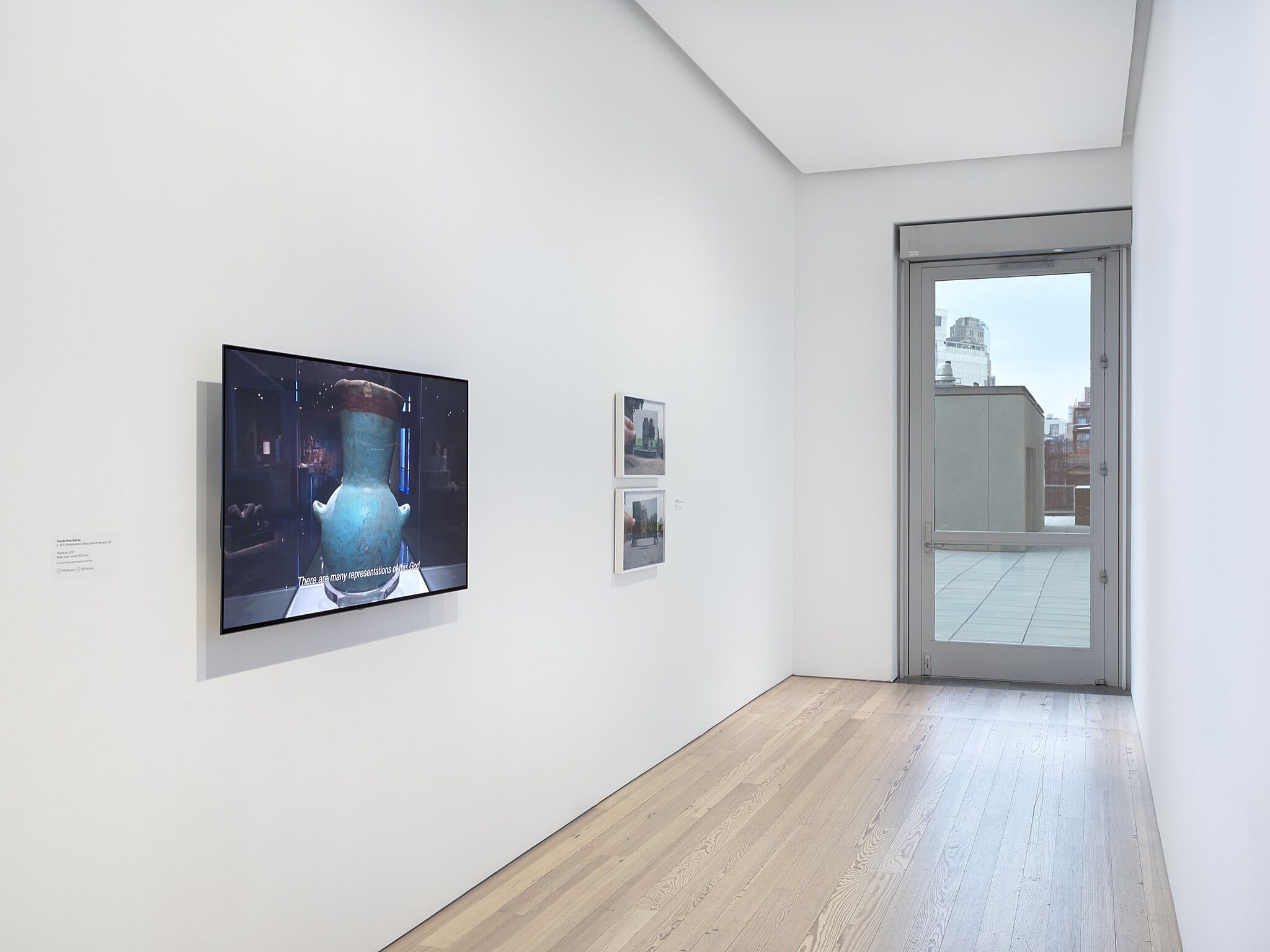 A photo of the Whitney galleries with various artworks.