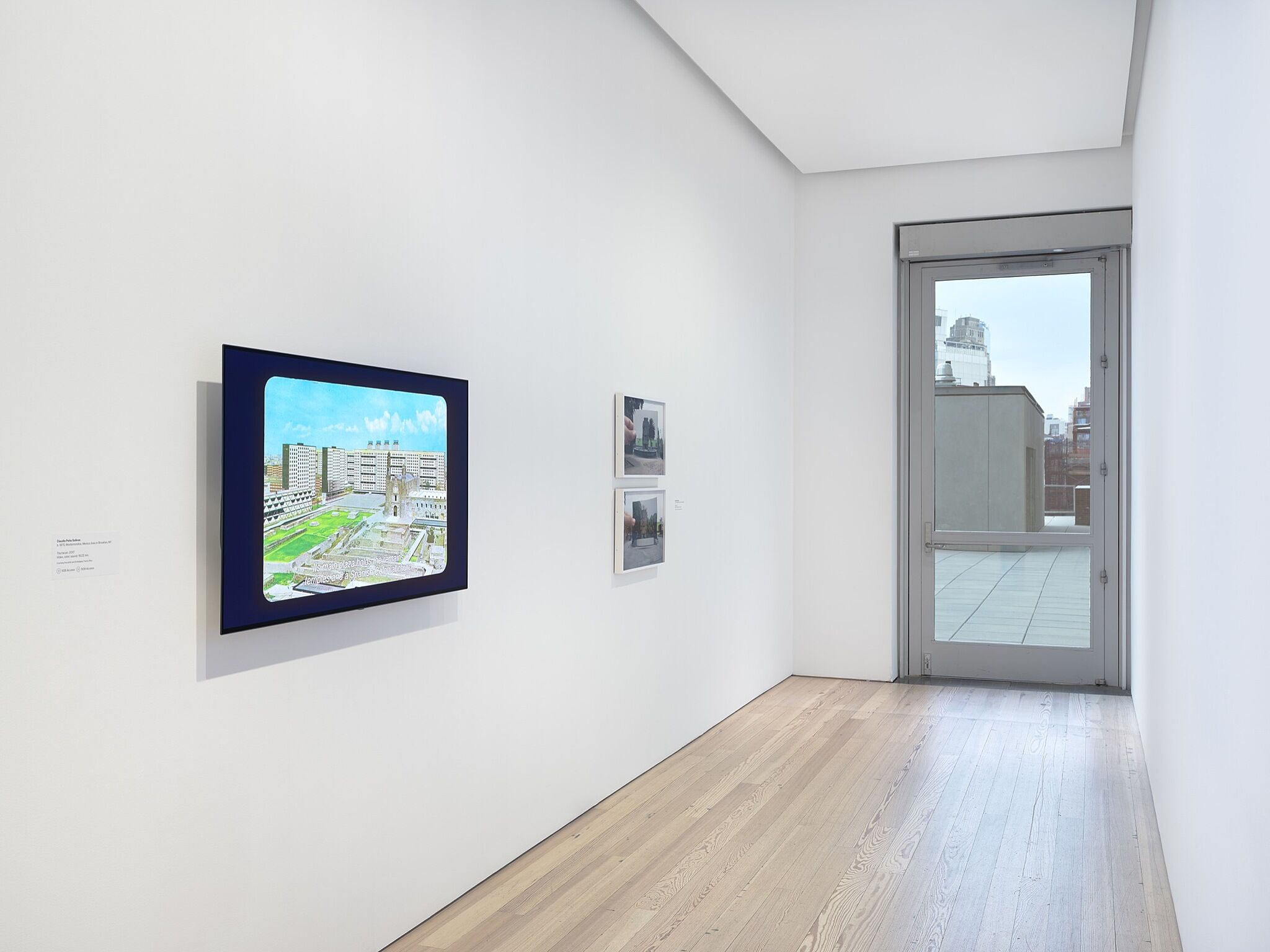 A photo of the Whitney galleries with various artworks.