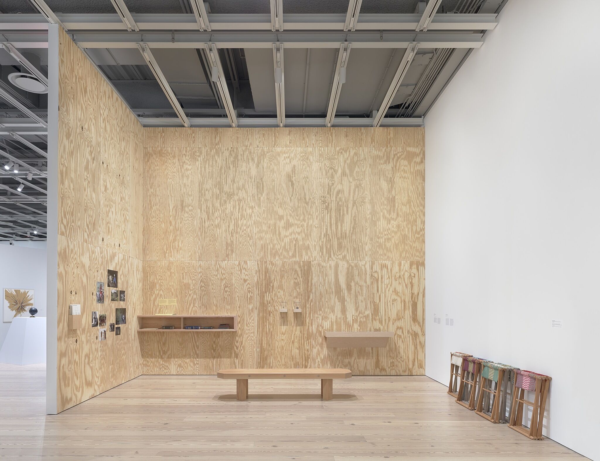 A photo of the Whitney galleries with various artworks.