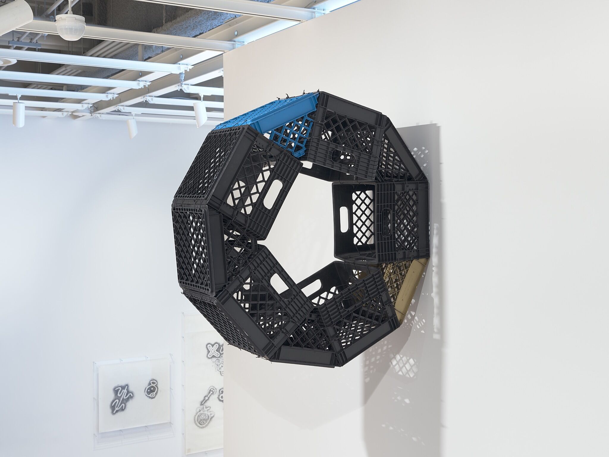 A sculpture made out of milk crates.