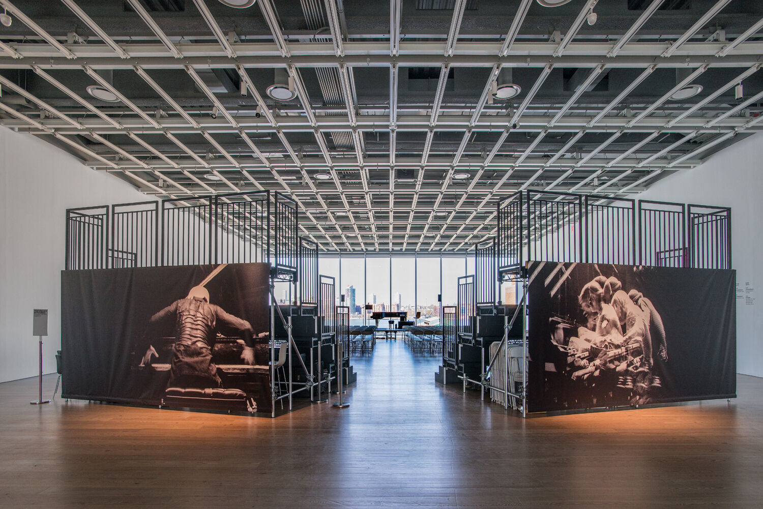 A back view of seating in a gallery space.